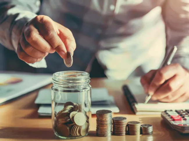 saving money in jar